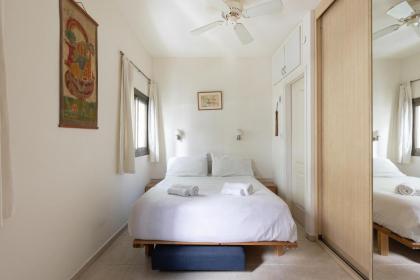 Cozy 3BR Apt w Big Windows 5 Min Walk From Beach by Sea N' Rent - image 13