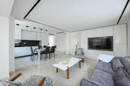 Bright & Modern 2BR Apt with Spacious Terrace 5-min from Beach by Sea N' Rent - image 26