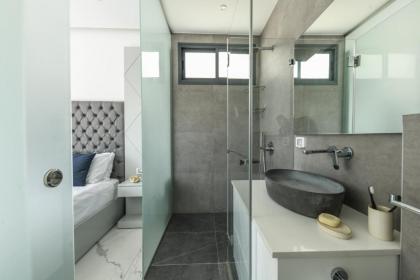 Bright & Modern 2BR Apt with Spacious Terrace 5-min from Beach by Sea N' Rent - image 29