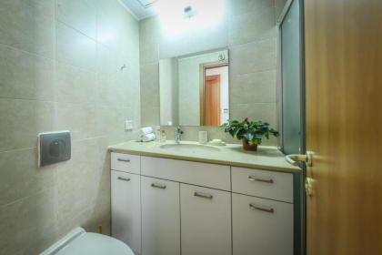 Chic Apartment w Balcony Mamad & Parking 3-min from Beach by Sea N' Rent - image 12