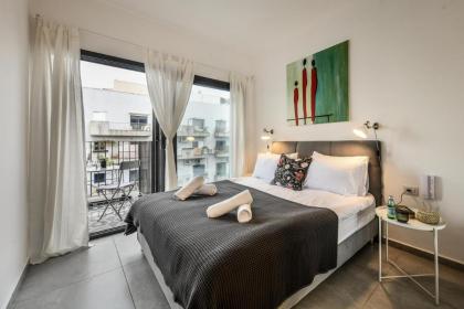 Stylish 2BR Apt w Balcony 5 min From Tel Aviv Port by Sea N' Rent - image 21