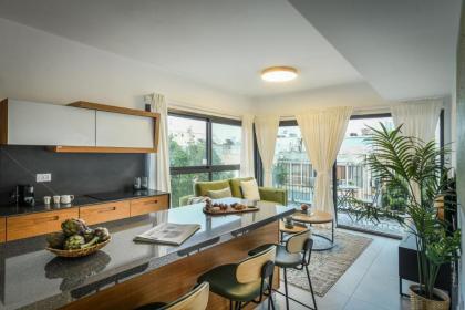 Stylish 2BR Apt w Balcony 5 min From Tel Aviv Port by Sea N' Rent - image 25