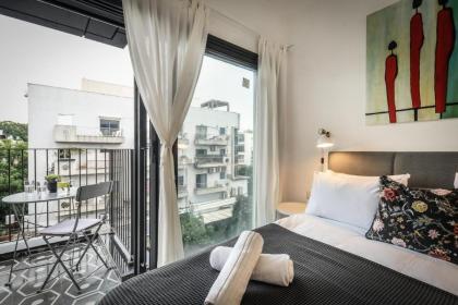Stylish 2BR Apt w Balcony 5 min From Tel Aviv Port by Sea N' Rent - image 26