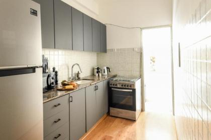 Cozy 2BR Apt w Green Oasis a 3 Min Walk from Beach by Sea N' Rent - image 27