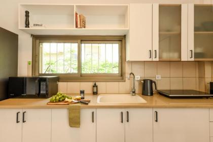 Cozy Apt with Mamad 4-min from the Beach by Sea N' Rent - image 23