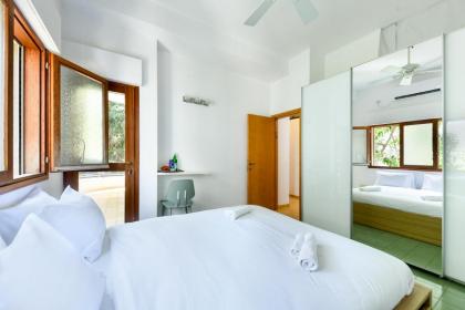 Spacious 3BR Penthouse w Rooftop 7 min from Beach by Sea N' Rent - image 25