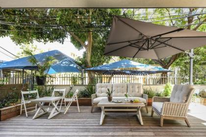 Stylish 2BR Apt with Patio in the Heart of Tel Aviv by Sea N' Rent - image 2