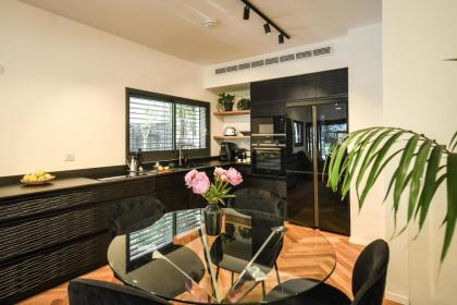 Stylish 2BR Apt with Patio in the Heart of Tel Aviv by Sea N' Rent - image 28