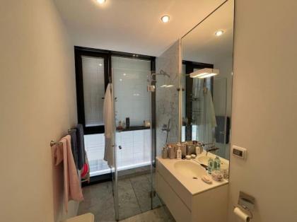 Modern Beachfront Haven 3BR w/parking by HolyGuest - image 5