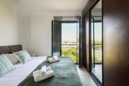 Vibrant 2BR apt w Balcony 5-min from the Beach by Sea N' Rent - image 21