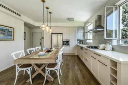 Chic 2BR Apt w Large Windows in Tel Aviv Old North Sea N' Rent - image 24